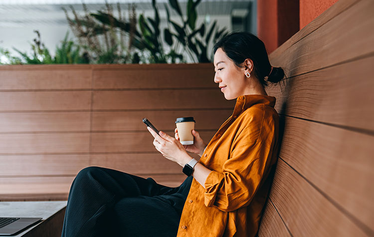 A woman holding a mobile phone
