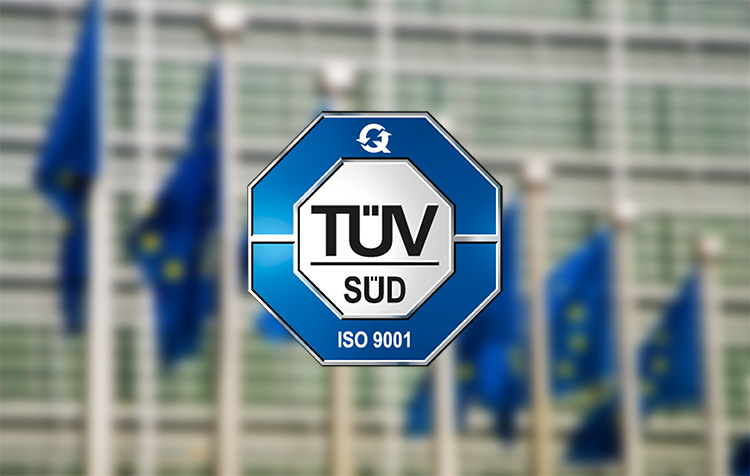 The TÜV logo and European flags in the background